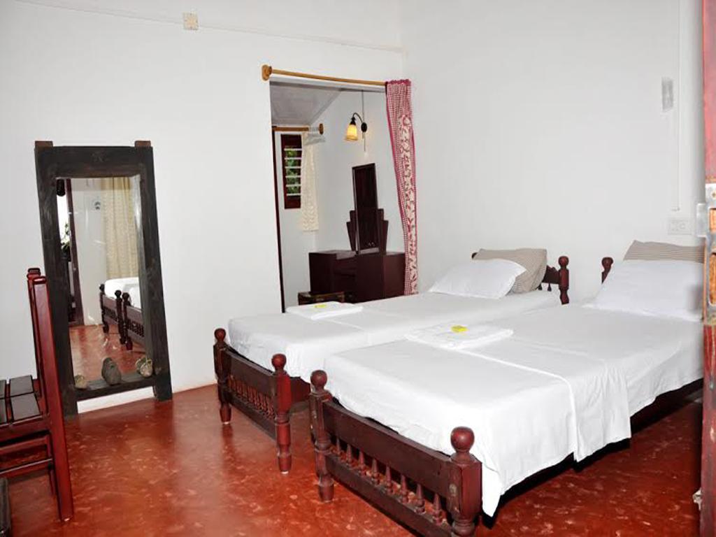Angeo Beach House Alappuzha Quarto foto