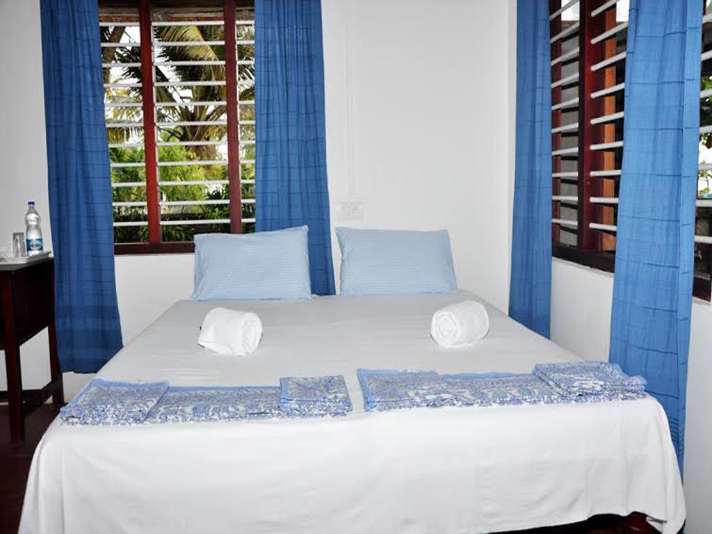 Angeo Beach House Apartamento Alappuzha Quarto foto