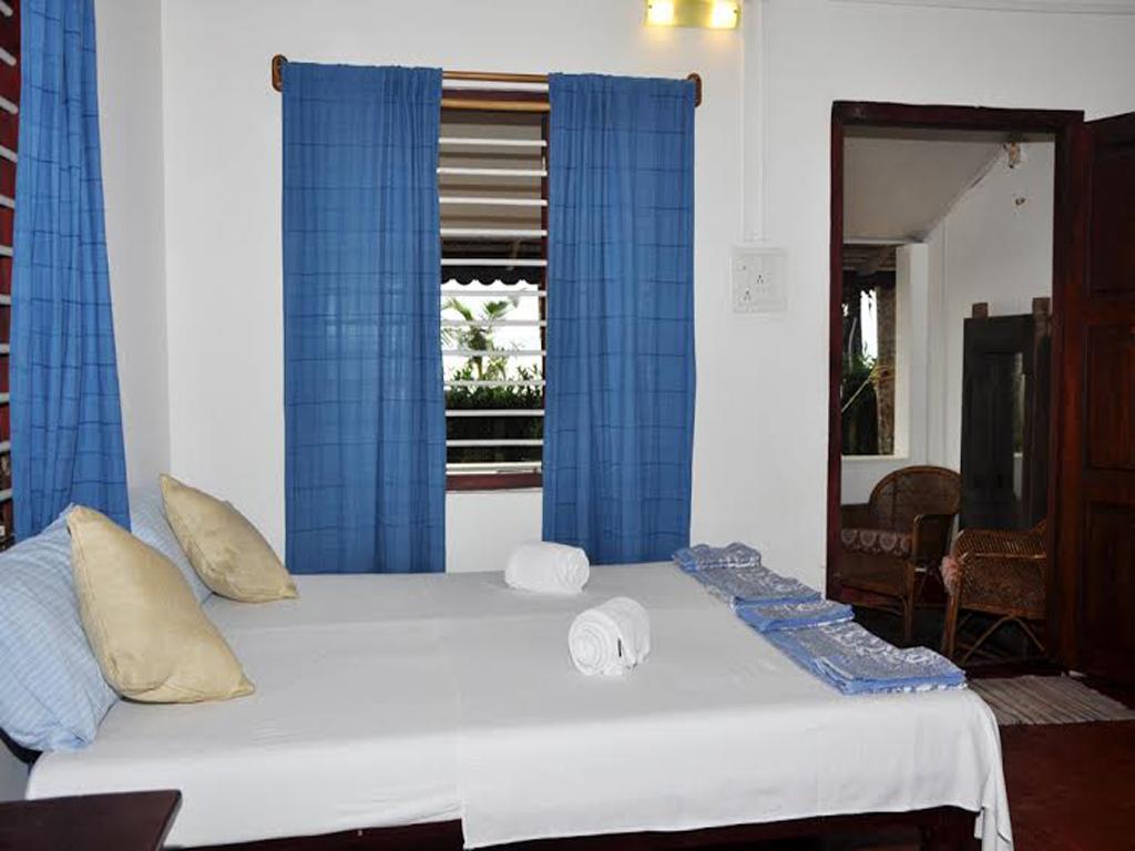 Angeo Beach House Alappuzha Quarto foto